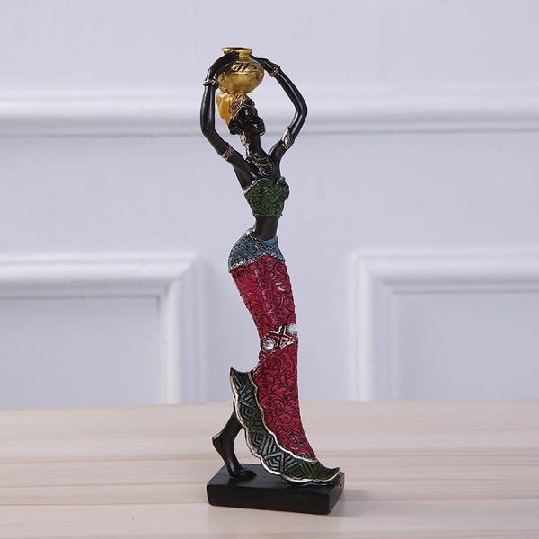 Afrikansk skulptur, vacker flickastaty Afrikansk kvinnlig figur