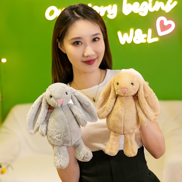 Udenrigshandel sød kanin plys legetøjsdukke Påskehare dukke otte-tommer gribemaskine dukke Pink Bunny 28CM