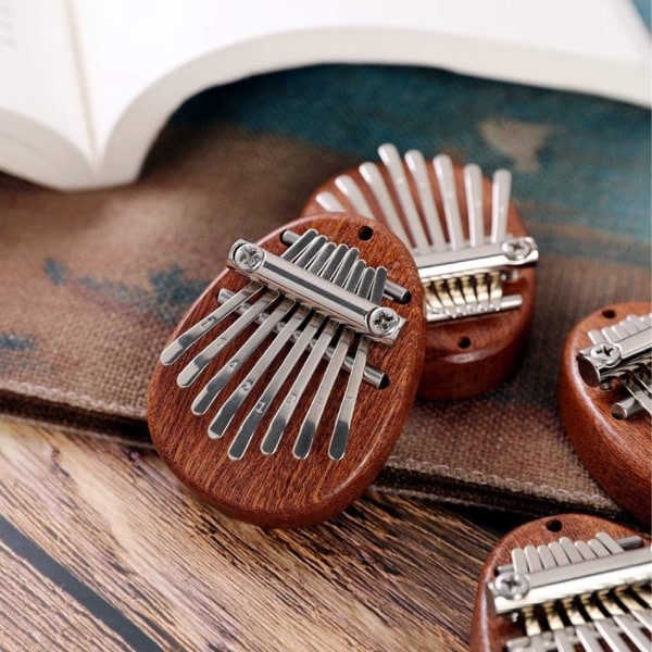 Galaxy Heminredning Mini Kalimba Portable med 8 touch f?r finger, tumme, present till barn, vuxna, nyb?rjare (stil 2)