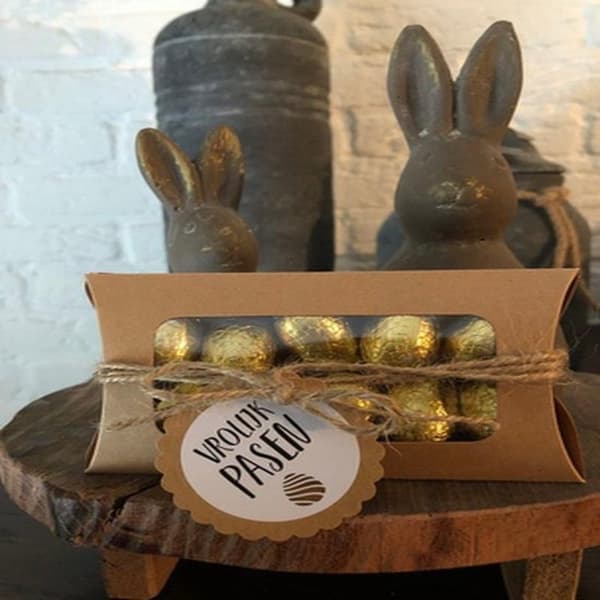 Brun pappersjulgodis och chokladhus presentförpackning med band