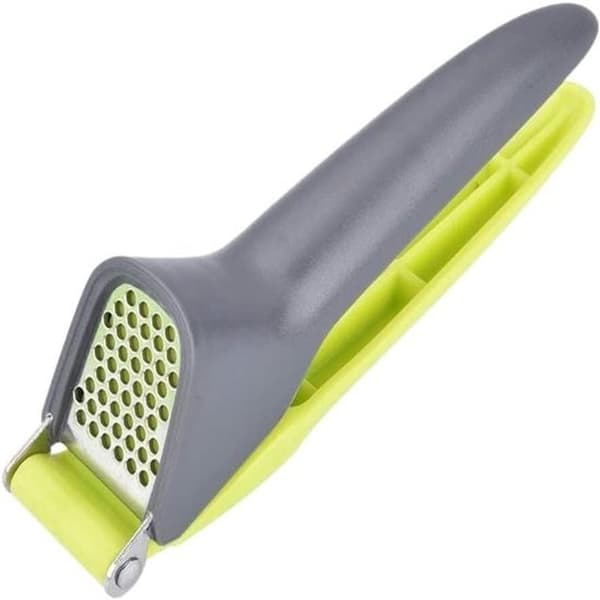 A practical kitchen helper: garlic and meat grinder, stainless steel garlic press, shredder and other kitchen utensils.