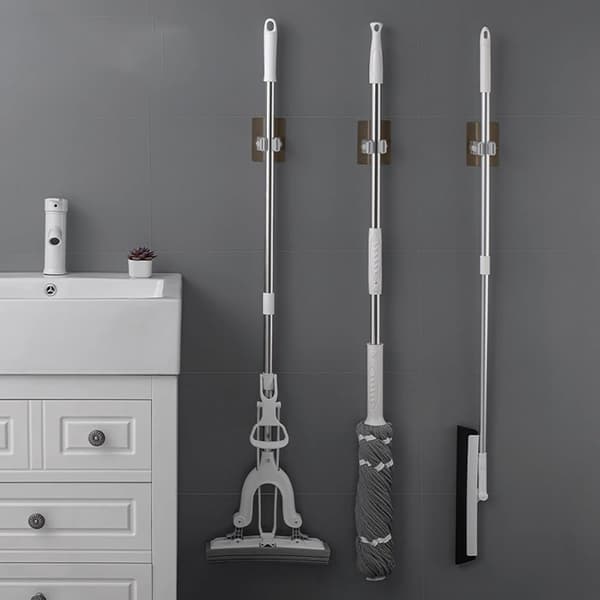 Self-adhesive broom holder wall-mounted with non-slip silicone roller for mop tools kitchen bathroom garage