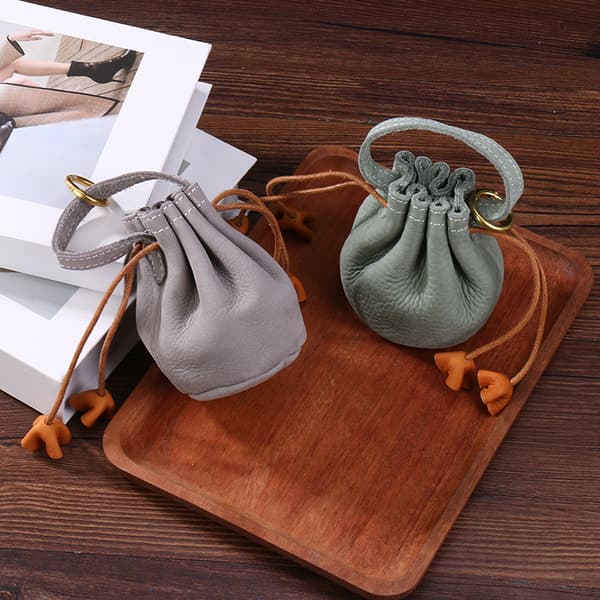 Gray Genuine Leather Mini Drawstring Pouch with Hand Loop for Storing Coins, Earbuds, Small Jewelry, and Daily Essentials