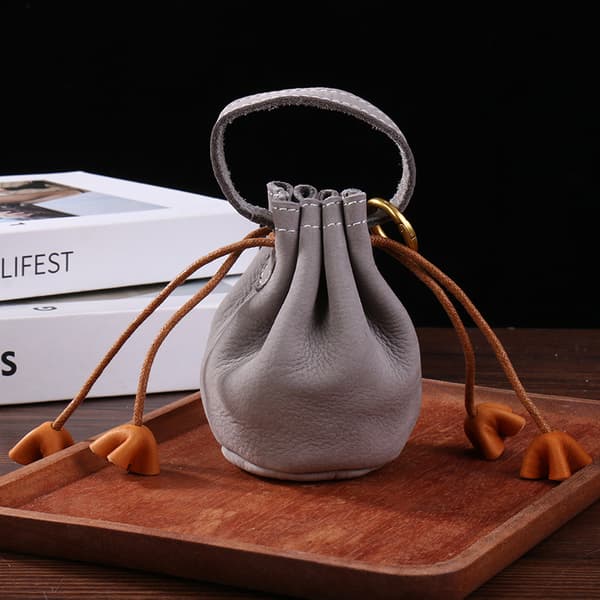 Gray Genuine Leather Mini Drawstring Pouch with Hand Loop for Storing Coins, Earbuds, Small Jewelry, and Daily Essentials