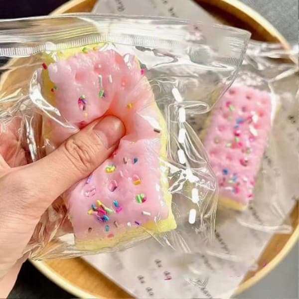 Soodakeksi stressilelu, simuloitu mansikkakeksipuristuslelu, dekompressio, vaaleanpunainen Rosa