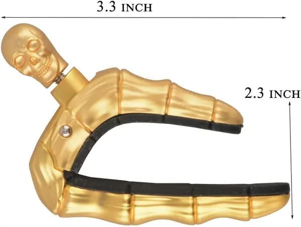 Gitar-capo i hodeskalledesign (egnet for akustiske og elektriske gitarer) samt ukulele-capo, gullfarget.