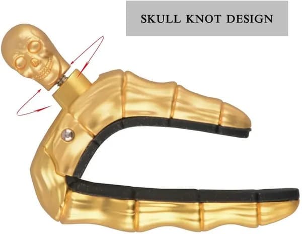 Gitar-capo i hodeskalledesign (egnet for akustiske og elektriske gitarer) samt ukulele-capo, gullfarget.