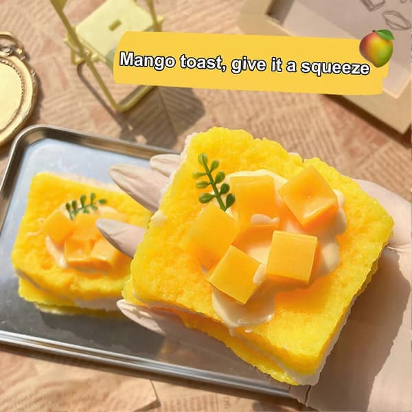 Langsomt stigende mango toast klemmelegetøj – blød TPR fidget – til stresslindring børn voksne