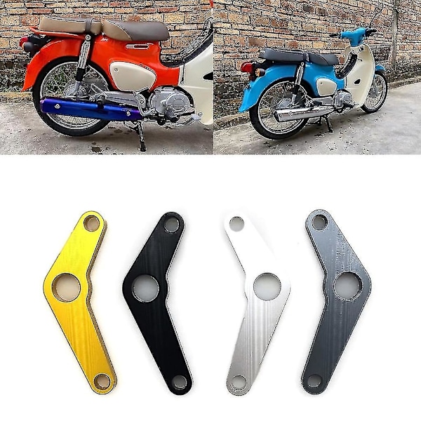 Vaihteiden akselin tukikisko vakauttimella Super Cub 110 -moottoripyörille