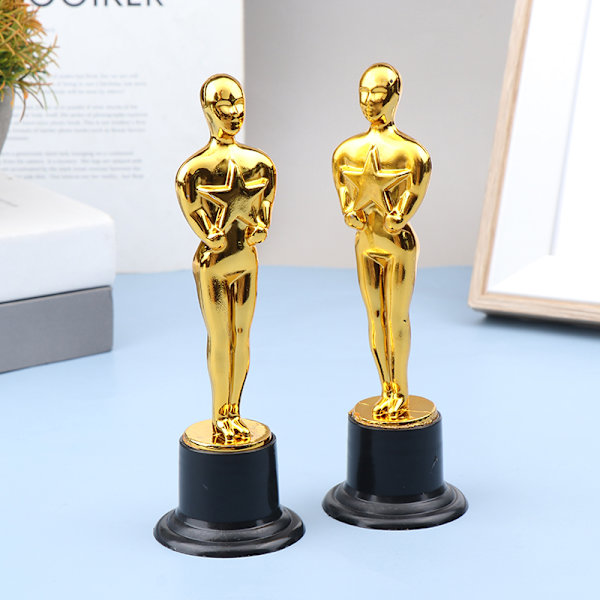 Liten gylden mann statue trofé barnas konkurransepris meg 1Pc