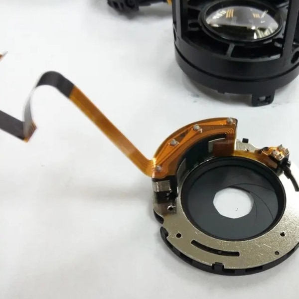 Linseblændekabel Rustfast professionel reparationsdele Digitalkamera Linseudløseråbningsledning Udskiftning til Canon 17-55mm (FMY)