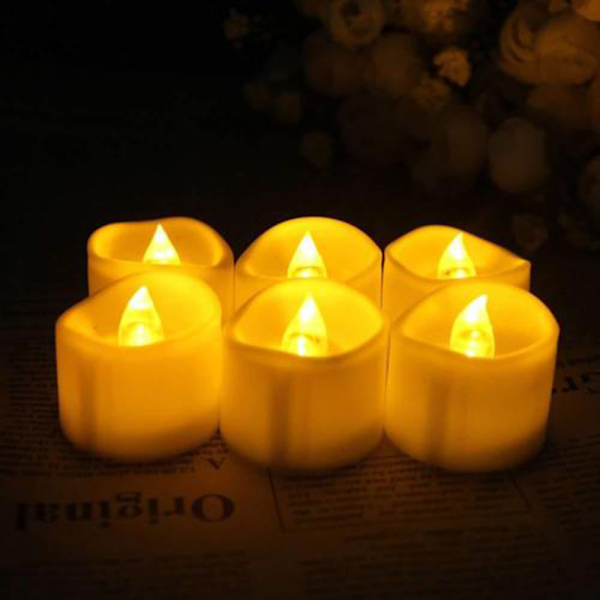 LED-telys med flammende/flimrende flamme - 12-pak med batteridr