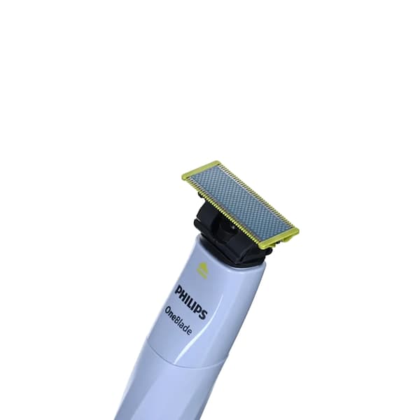 Philips OneBlade First Shave QP1324/20, jossa on kaksipuolinen