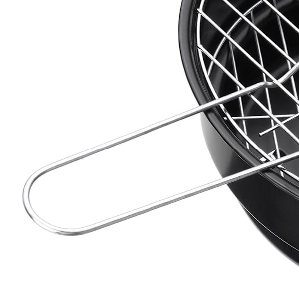 Pieni ja tehokas kannettava grilli - täydellinen piknikille ja