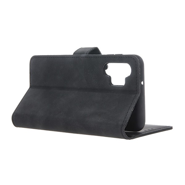 Velvet Flip Case jalustalla Motorola Moto E13 - musta