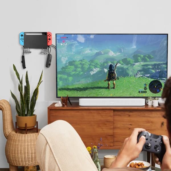 Väggfäste i klarplast till Nintendo Switch 1/2