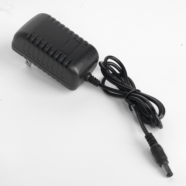 12V1A nätadapter Väggmonterad