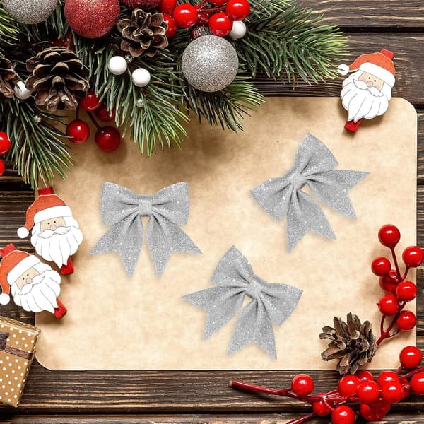 A set of 12 20 cm silver decorative Christmas bows - small sequin