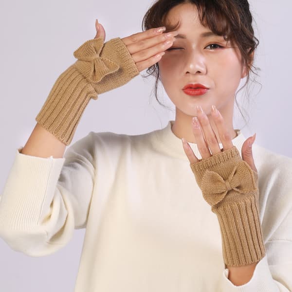 Beige stickade fingerlösa handskar med rosett