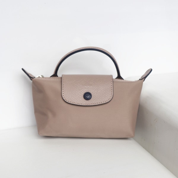 Longchamp Mini Dumpling Väska Crossbody Handväska Damväska Mini Liten Väska med Hålslagning och Axelrem
