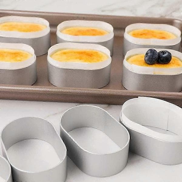 Oval aluminiumostform kageform med bagepapir - Sæt med 10