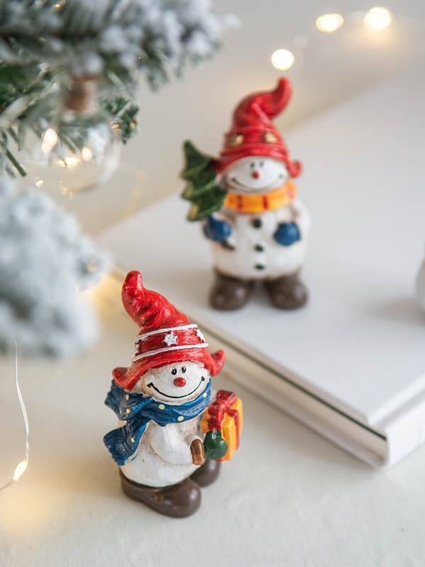 1 x Julefigur Resin Snømann Ornament (mønster tilfeldig)