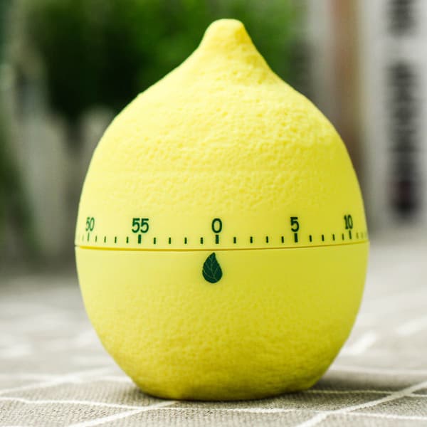Tecknad tidshanteringschef fruktmekanisk timer