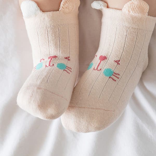 Åtte par babystrømper lilla, oransje, hvit, rosa 6-8cm KLB