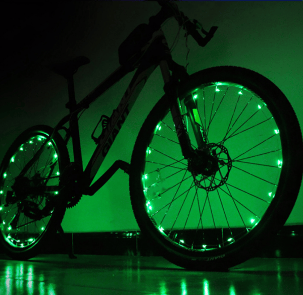 Green LED bicycle wheel lights in one piece provide brightness and v