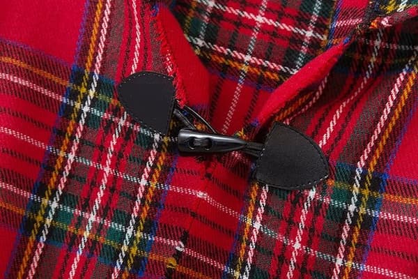 Damponcho med tofsar i vintage rutstickning