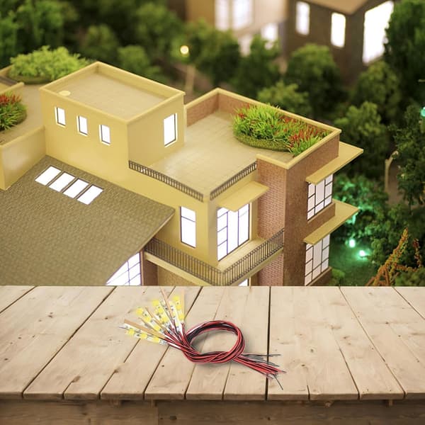 Effektivt system med 15 förkopplade LED-remsor för miniatyrbelysning, perfekt för scenarier (VARMT LJUS)