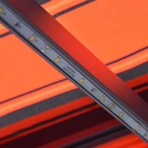 Maison Exclusive - Manuell markis med solenergi LED 3,5 x 2,5 m Orange och brun