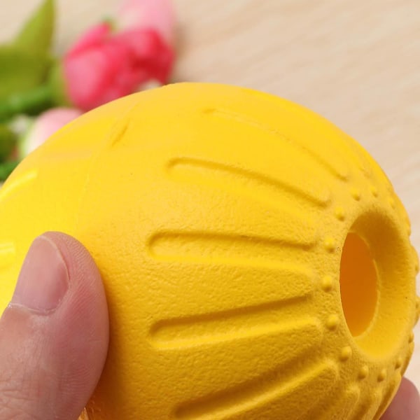 7 cm bærbar Eva-sfære hul bold Bidfast kæledyrshundetræningslegetøj Bold med bærereb Bidefast Magic Ball Pet