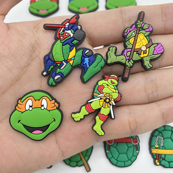 20 kpl/setti Teenage Mutant Ninja Turtles -hahmoja kenkien riipuksia Crocs-kenkiin ja sandaaleihin koristeeksi ja lahjaksi
