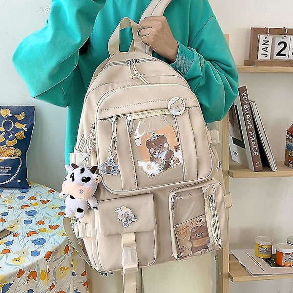 Reppu söpöillä pinni-lisävarusteilla, pehmoinen riipus Kawaii-reppu