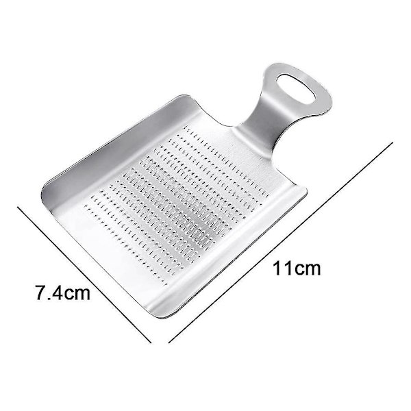 Inkivääriraastin, ruostumattomasta teräksestä valmistettu lapiomainen raastin inkiväärille, valkosipulille, hedelmille ja juureksille