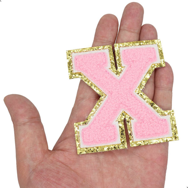 Englannin kirjaimen X rauta-sovellettavat korjauslaastarit Aakkosten ompelutarrat Vaatteiden merkit, kultaisen glitterin reunalla, liimapintainen tarra (Vaaleanpunainen X) XPink
