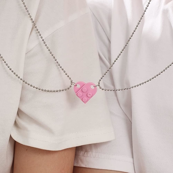 Kauniit emaloidut dinosauruksen riipuskaulakorut, pariskunnan mustavalkoiset dinosauruksen lohikäärmeen riipuskaulakorut choker KPOP-korut lahjoina