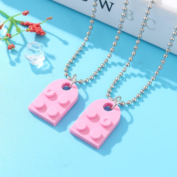 Kauniit emaloidut dinosauruksen riipuskaulakorut, pariskunnan mustavalkoiset dinosauruksen lohikäärmeen riipuskaulakorut choker KPOP-korut lahjoina