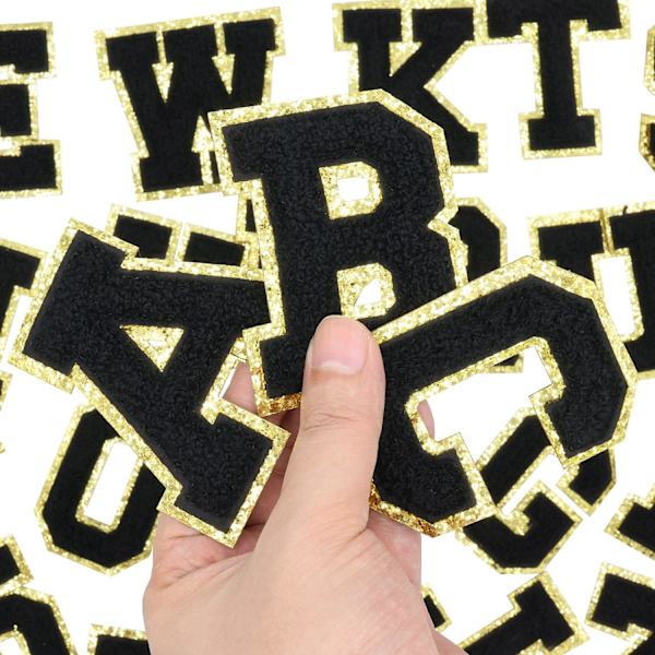 Englannin kirjain L - Silitysmerkit Aakkoset Ompelemissovellukset Vaatteiden merkit, Kultaisella glitter-reunuksella, Liima-taustatarra（Musta L）LMusta