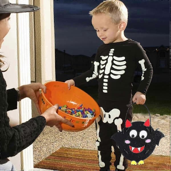 Gjør-det-selv Halloween-godteribøtte med tegneseriedesign for barnas knask eller knep-moro