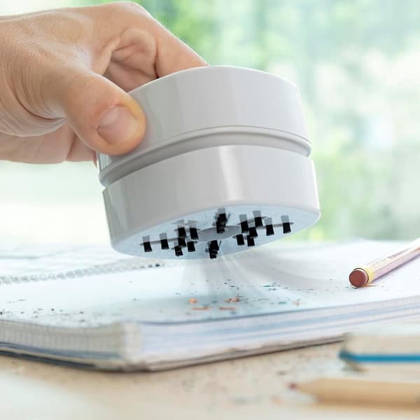 This mini desktop vacuum cleaner can quickly and easily clean small areas. Its compact and lightweight design makes it ideal for use. (White)