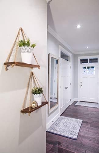 Rustic wooden hanging shelf with rope and hooks