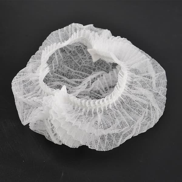 100pcs/lot Disposable Shower Caps Hat Non-woven Shower Caps One-off Bathing Elastic Shower Cap Bath Caps Solid Color