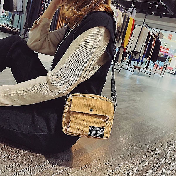 Canvas mini 2024 messenger bag