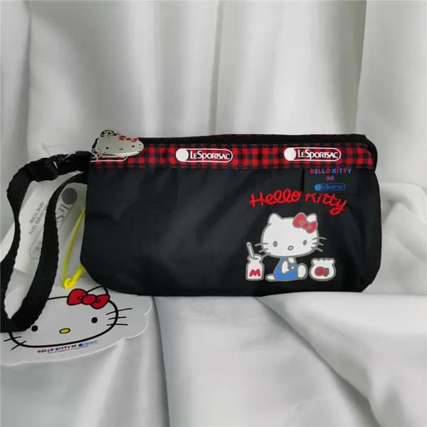 Lesportsac New Sanrio Kawaii Hello Kitty Snoopy Damväskor Tecknade handledsväskor Mode Söta telefonväskor Armbandsväskor 27