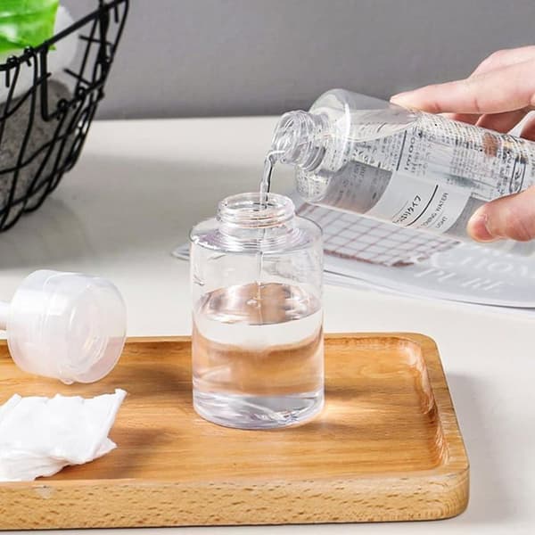 Set med 4 150ml nagellacksremoverdispensrar, resevänlig tonerflaska