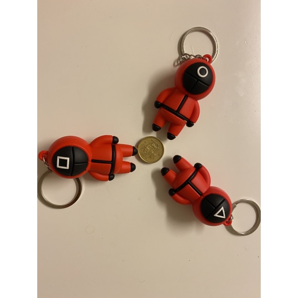 Squid game - Silikon nyckelring - Slumpmässig färg - julklapp