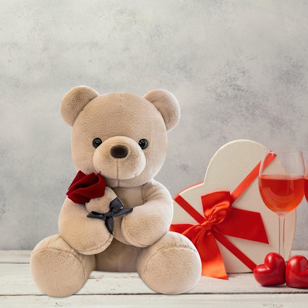 Sød og krammelig bamse, 25 cm med rose. Blød pelsbamse. Udstoppede bamse. Lavet af