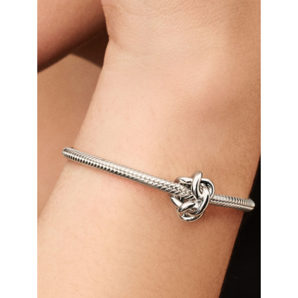 - Infinity Knot Charm - Sterling silver